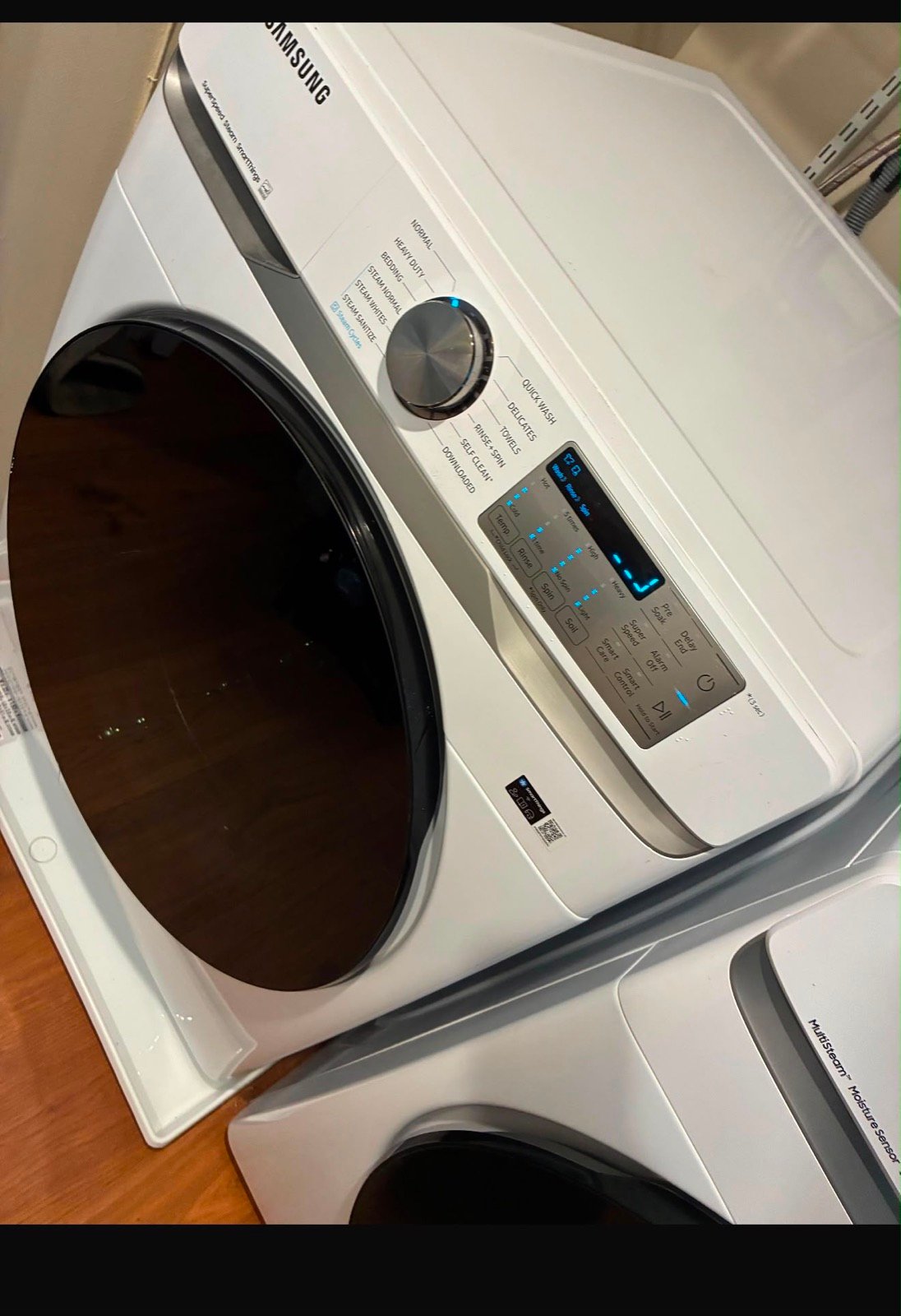 Samsung front-load washer and dryer pair in a home laundry area